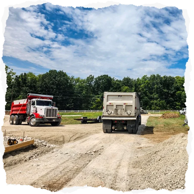 Hoover's Bobcat Service dump trucks on a excavation job